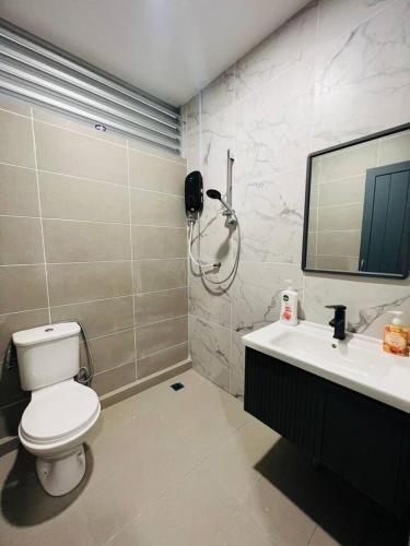 T & T Kuching Homestay, Kučing (fotografie 10)