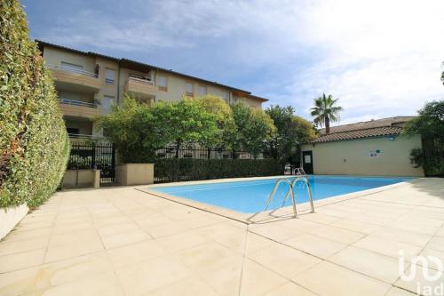 Swimming pool, *Le Carpe Diem, Appartement 2 chambres, piscine, 2 Parking, Clim* in Ovalie