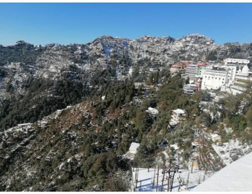 Hotel Atithi, Near Yes Bank, Mall Road, Mussoorie