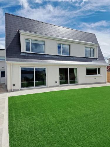 Buncrana Beach House by Wild Atlantic Wanderer