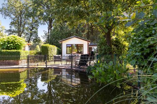 Huize Bosrijk aan het water, Ferienwohnung in Kootwijk