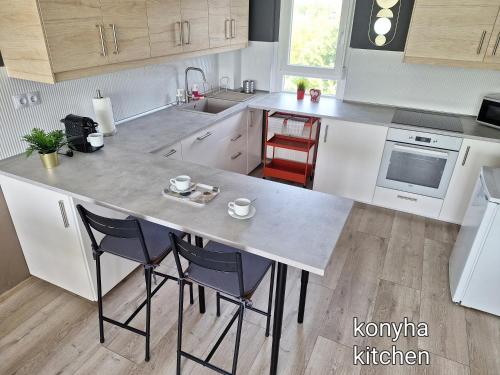 Kavics Apartman Tata