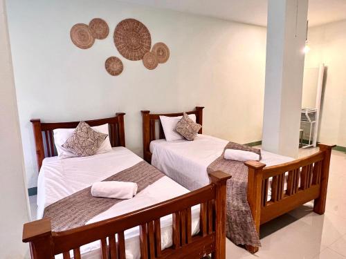 บ้านไทยไออุ่น Room Type - Twin Room with Private Bathroom