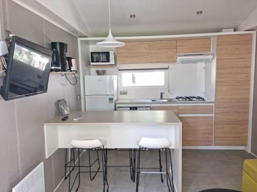 Location d'un mobil-home de 35 m² au Camping Les Sables d'Or - 4 étoiles avec grand parc aquatique - Location saisonnière - Agde