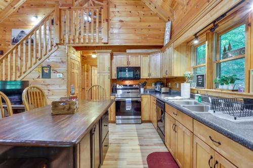 Riverfront Ellijay Cabin with Deck and Pool Access!