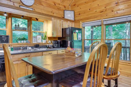 Riverfront Ellijay Cabin with Deck and Pool Access!