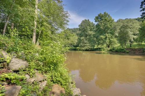 Riverfront Ellijay Cabin with Deck and Pool Access!