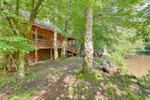 Riverfront Ellijay Cabin with Deck and Pool Access!