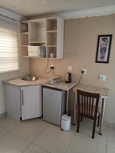 ห้องครัว, Kgatholoha guest house in เคลิกส์ดอร์ป