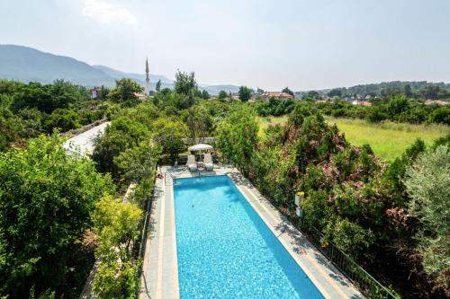 Vacation Flat w Pool Garden Patio BBQ in Mugla - Location saisonnière - Muğla