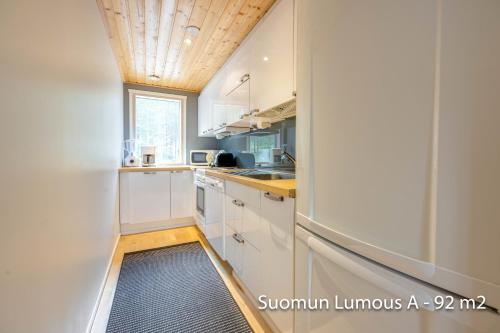 Holiday Apartments Suomun Lumous