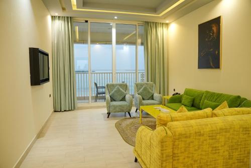 Flamingo Beach Hotel                                                                             near Falaj Al Mulla garden Park