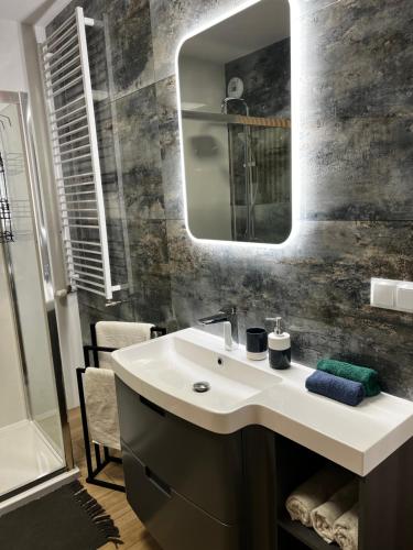 Ванна кімната, Apartament Szmaragdowy. in Седльце