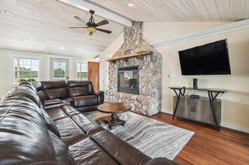 Lakefront Gladwin Vacation Rental with Deck and Dock!