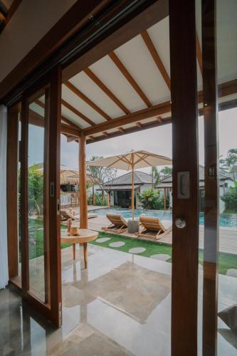 Balcony/terrace, EHOA NYANYI BEACH Boutique Hotel - In front of entrance to NUANU in Tanah Lot