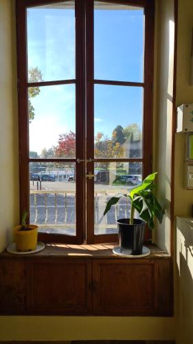 Appartement Cozy, vue sur le port, gîte, les pieds dans l'eau