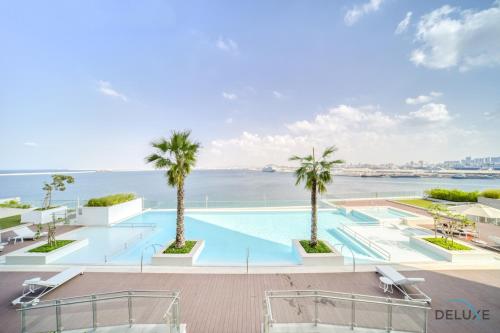 Swimming pool, Peaceful 1BR at The Anwa By Omniyat Dubai Maritime City by Deluxe Holiday Homes in Dubai Maritime City