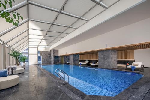 Swimming pool, Swissôtel Beijing Hong Kong Macau Center in Sanlitun Bar St. & Embassy Area