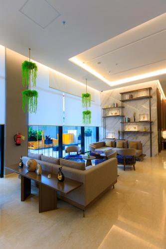 Shared lounge/TV area, Calma 31 Apartment in Makassar