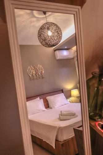 Delfini Beach Hotel & Suites Delfini Beach Hotel & Suites