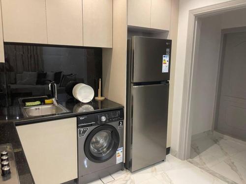 Kitchen, Oqdeh Delux Apartments in Jerash