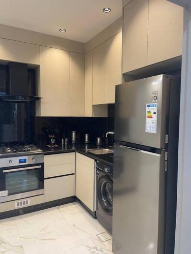 Kitchen, Oqdeh Delux Apartments in Jerash