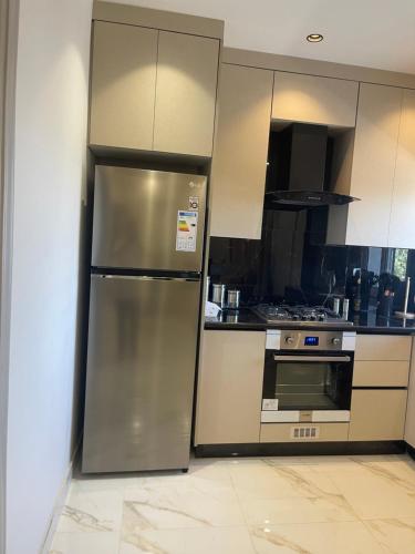 Kitchen, Oqdeh Delux Apartments in Jerash