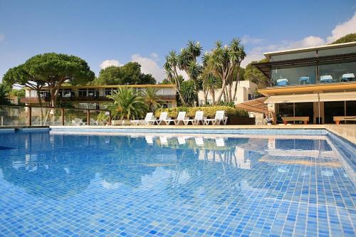 Appartement in Castell-Platja D'aro mit Garten, gemeinsamem Pool und Terrasse