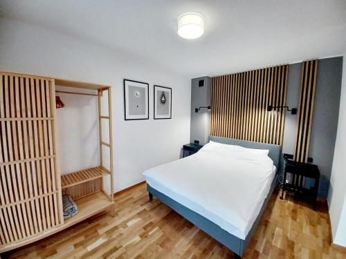 Kolory Warmii Apartamenty Biały i Szary