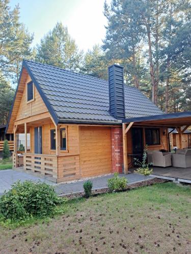 Warta House - Domek z kominkiem nad Wartą