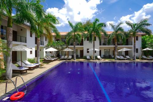 Tamarind Tree Hotel - Tap to explore photos