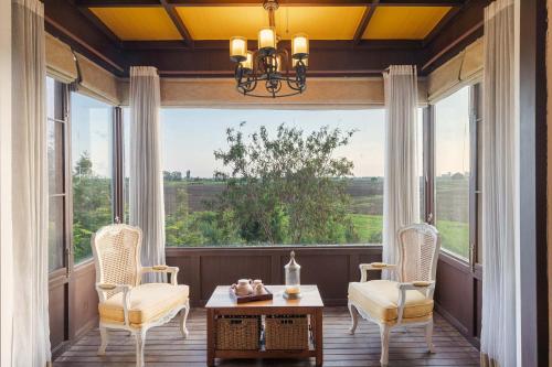 StayVista's The Barn House - Farm-View Villa with Modern Rustic Interiors, Indoor Pool & Bar
