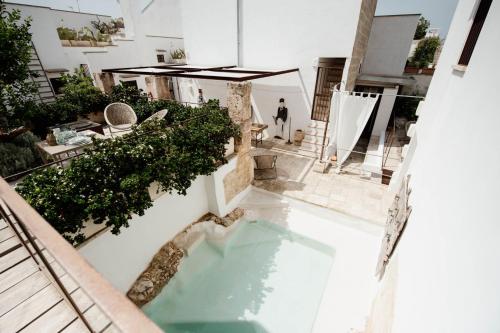 GuestHost - Corte 14 15 - Apartments with terrace and pool, Matino (photo 3)