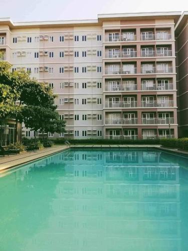 Trees Residence in Quezon City with balcony.