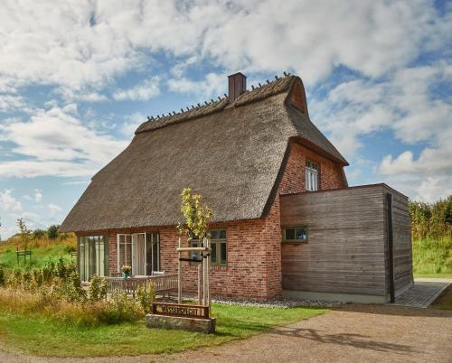 B&B Nieby - Reetdorf Geltinger Birk Künstlerkate Wasserspecht - Bed and Breakfast Nieby