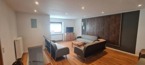 Koplietošanas atpūtas telpa ar TV, Ferienhaus Paul in Neidenbach