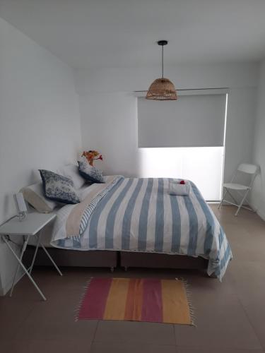 Loft acogedor con área de parrilla y piscina