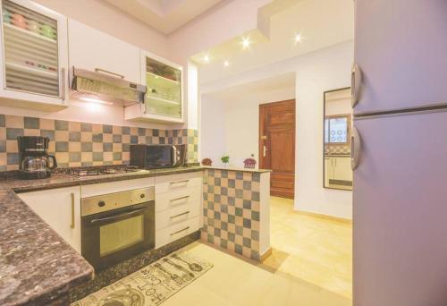Kitchen, lovely 2 bedroom vacation home with pool/beach in Skhirat