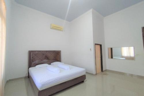 OYO 92808 Kost Nino Telanaipura