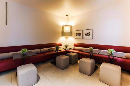 ห้องส่วนกลางสำหรับนั่งเล่น/ดูทีวี, โรงแรมคาซา โปลี มันโตวา (Hotel Casa Poli Mantova) in มอนโตวา