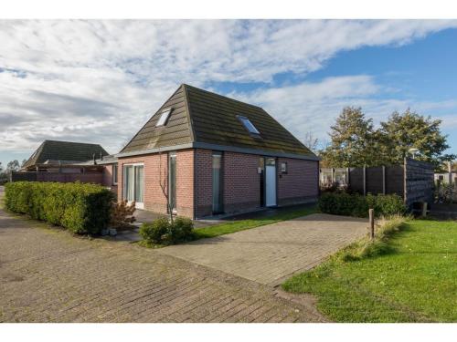 Family house on a small park with a large playing field