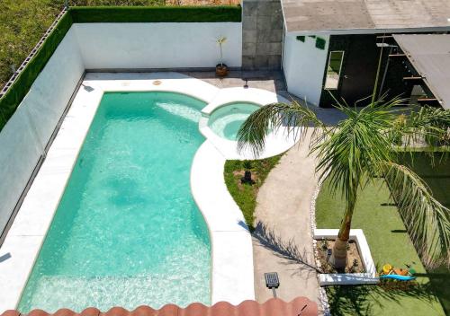 Incredible in-town pool house with BBQ area