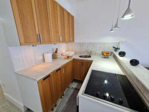 廚房, Beach Serenity Studio on Makenzy in 卡斯特拉海灘