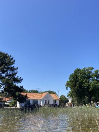 Maison au Bord de l'eau - Location saisonnière - Carcans