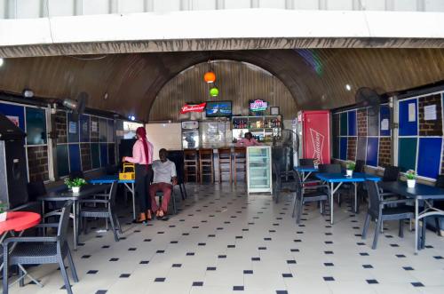 Паб/Коктейль-бар, PROXIMA INN in порт Харкорт