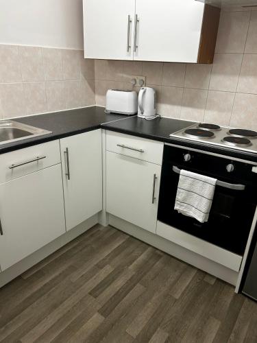 Kitchen, Bradford Service accommodation in Manningham