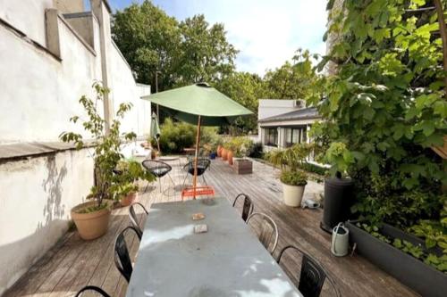 Loft familial avec grand jardin verdoyant gîte à louer Saint-Mandé