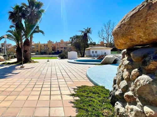 Premium apartment with communal pool in front of Roquetas beach