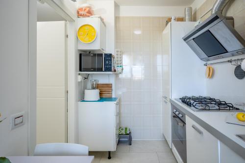 Kitchen, Kalbia Rooms managed by HolyDaisy - Renovated, functional, intimate and more in Cagliari