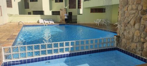 สระว่ายน้ำ, Apartamento praia do Lázaro (Apartamento praia do Lazaro) in ปรายา โด ลาซาโร